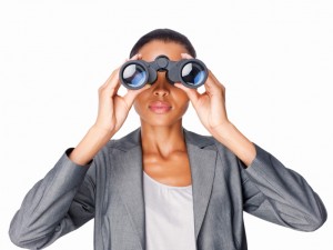 Businesswoman Looking Through Binoculars - Isolated